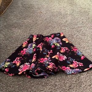 Girls black and floral skater skirt